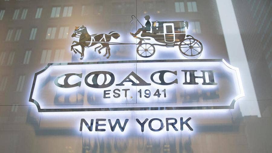 Coach Outlet is selling a $150 wallet purse for just $49 - TheStreet