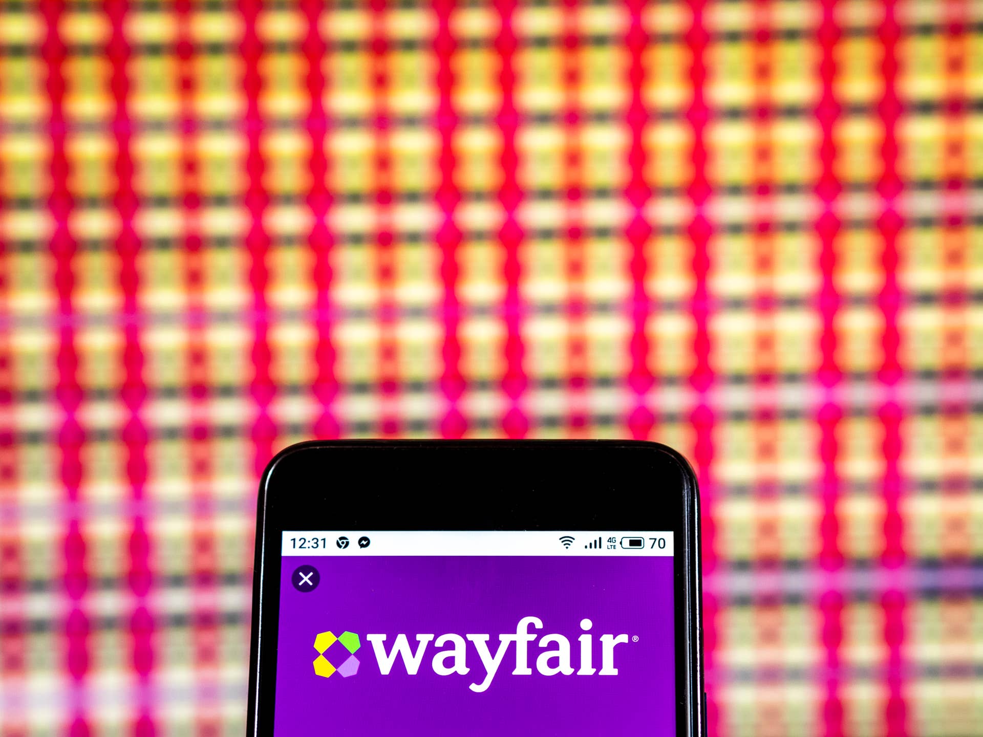 KIEV, UKRAINE - 2019/01/07: In this photo illustration, the Wayfair Company logo seen displayed on a smartphone. (Photo Illustration by Igor Golovniov/SOPA Images/LightRocket via Getty Images)