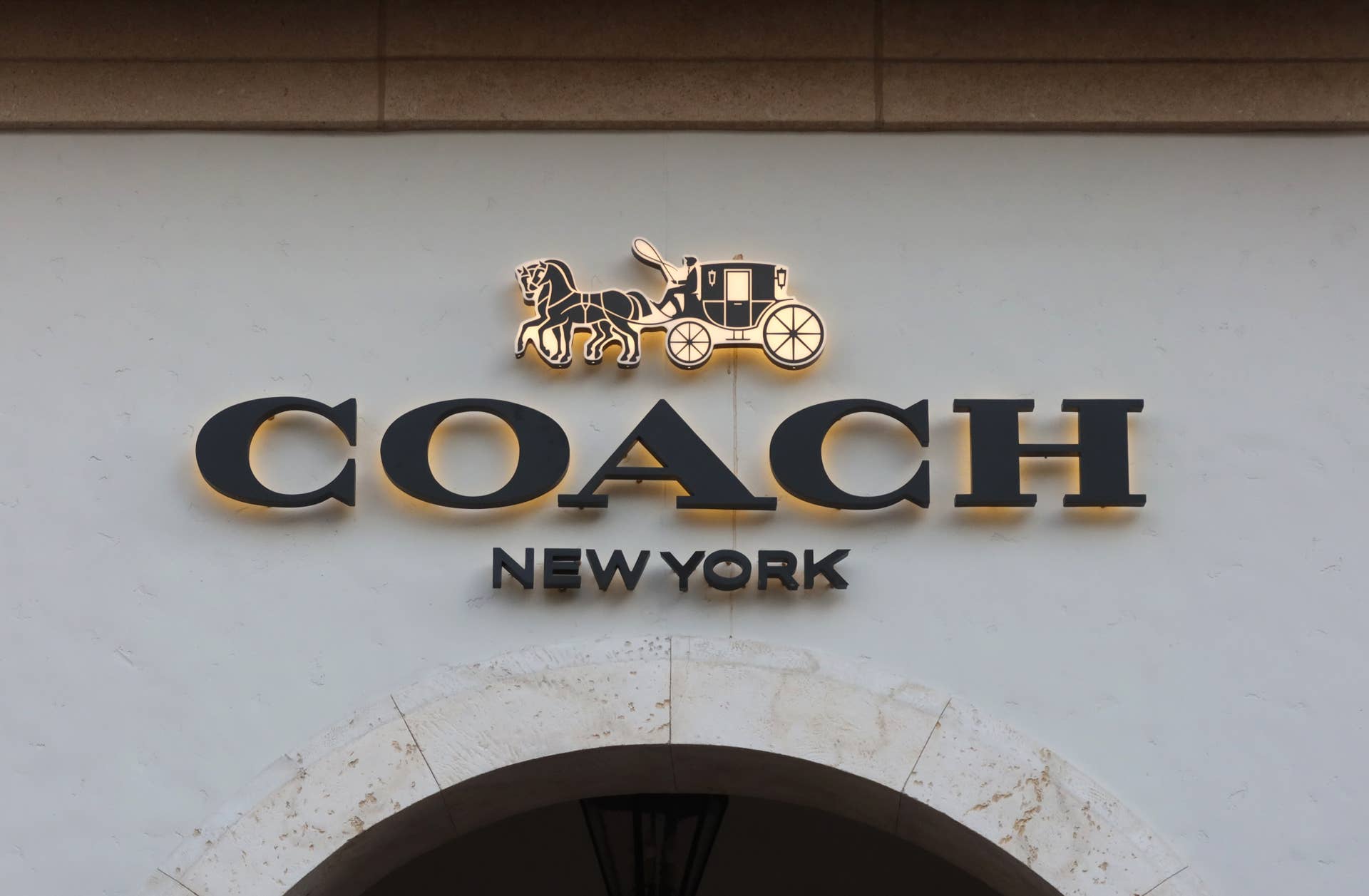 Coach Outlet's new magenta collection offers the perfect pop of color for fall