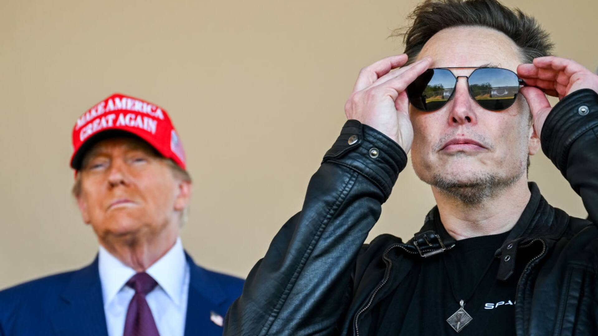 U.S. President Donald Trump and Elon Musk. Lead.