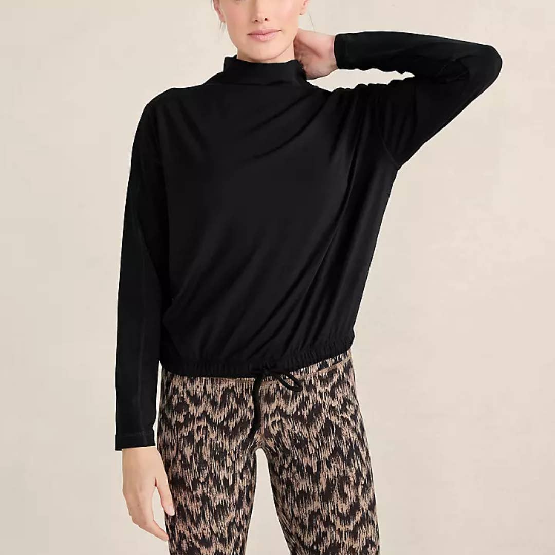 Spring Scale Words Ann Taylor is selling an $88 funnel neck top for $28 - TheStreet