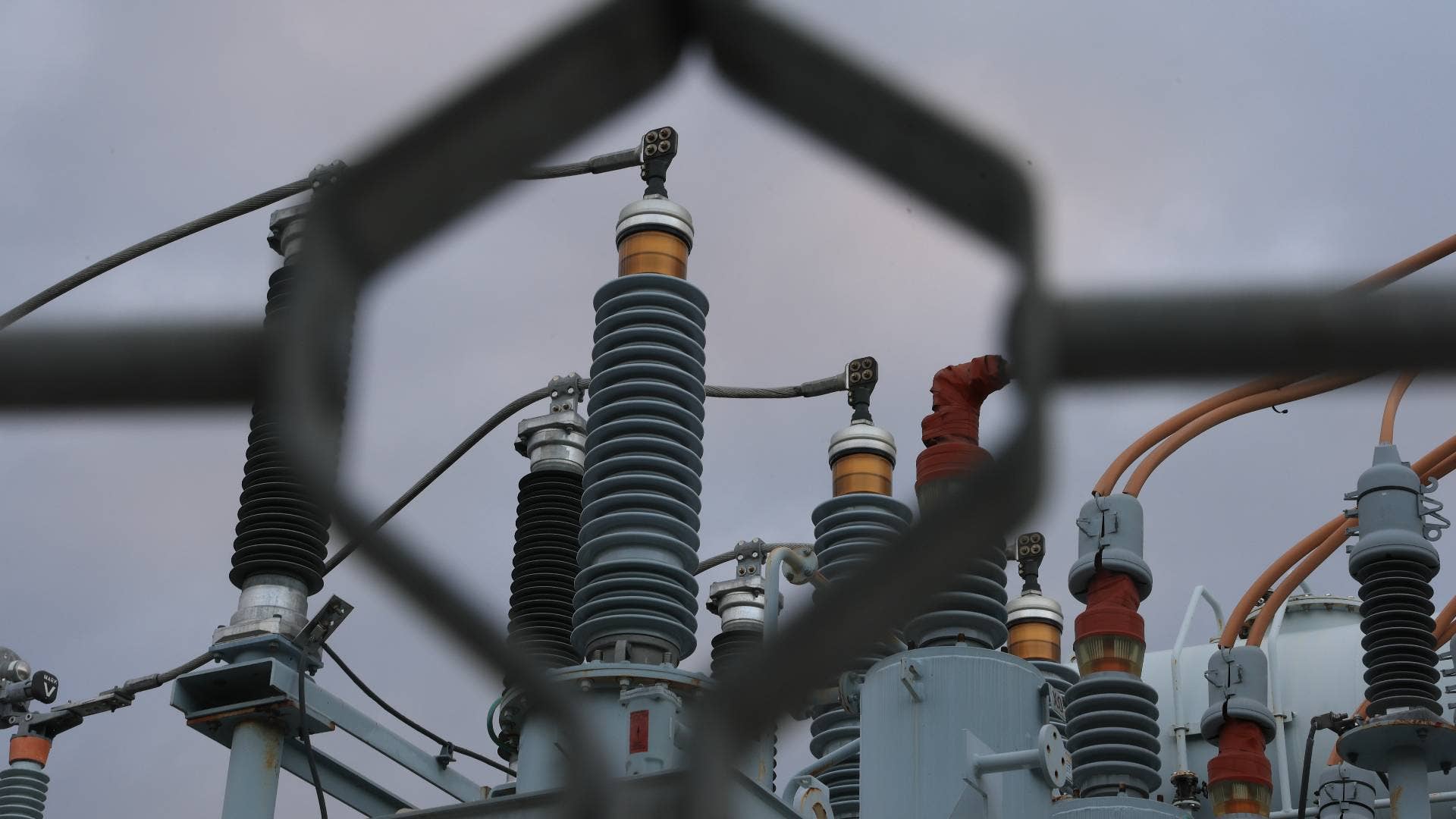 High voltage power lines run through a sub-station along the electrical power grid on January 14, 2026 in Miami, Florida