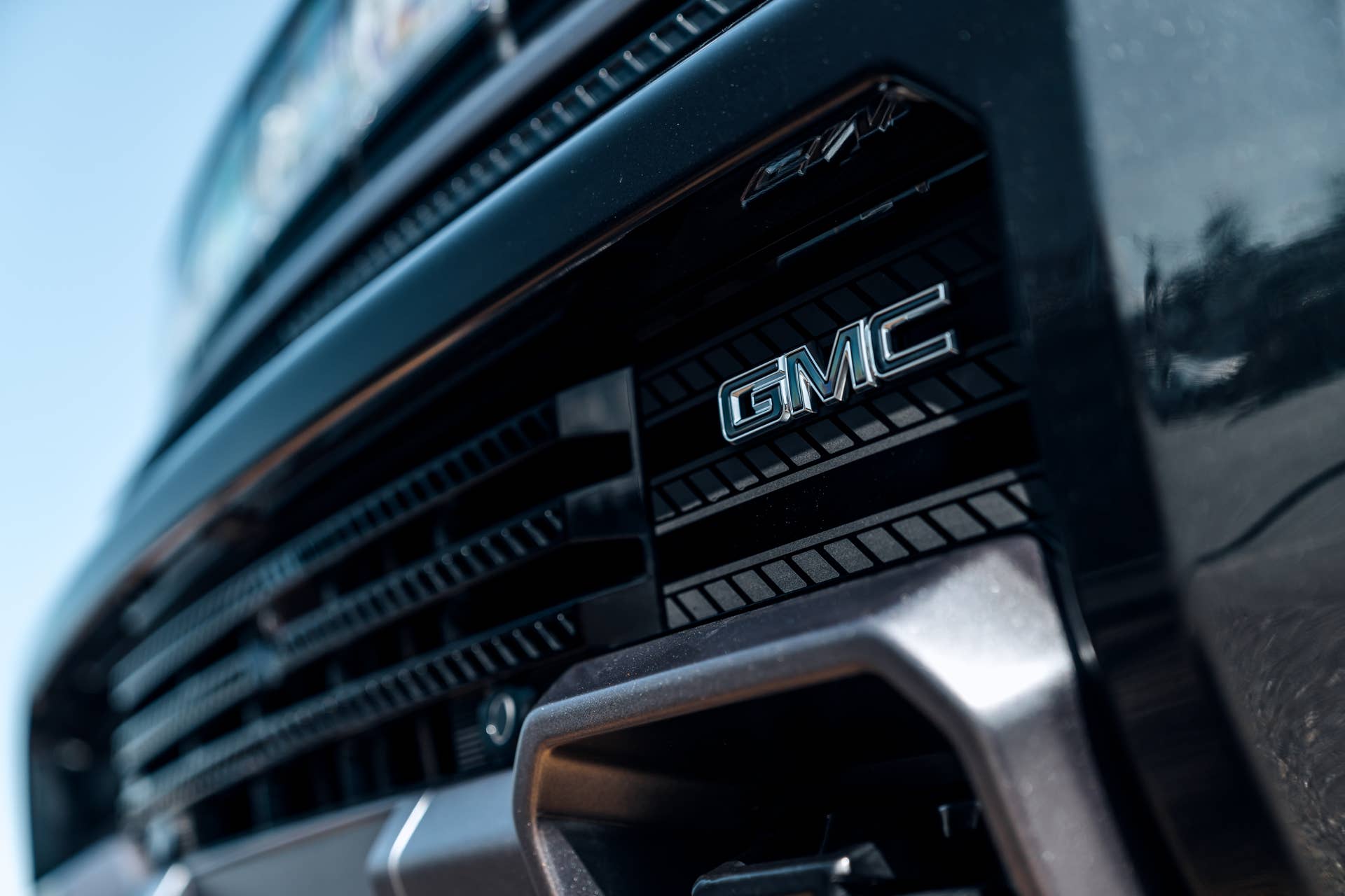 Seattle, WA, USA
April 17, 2023
Hummer EV in black showing the grille with the GMC logo