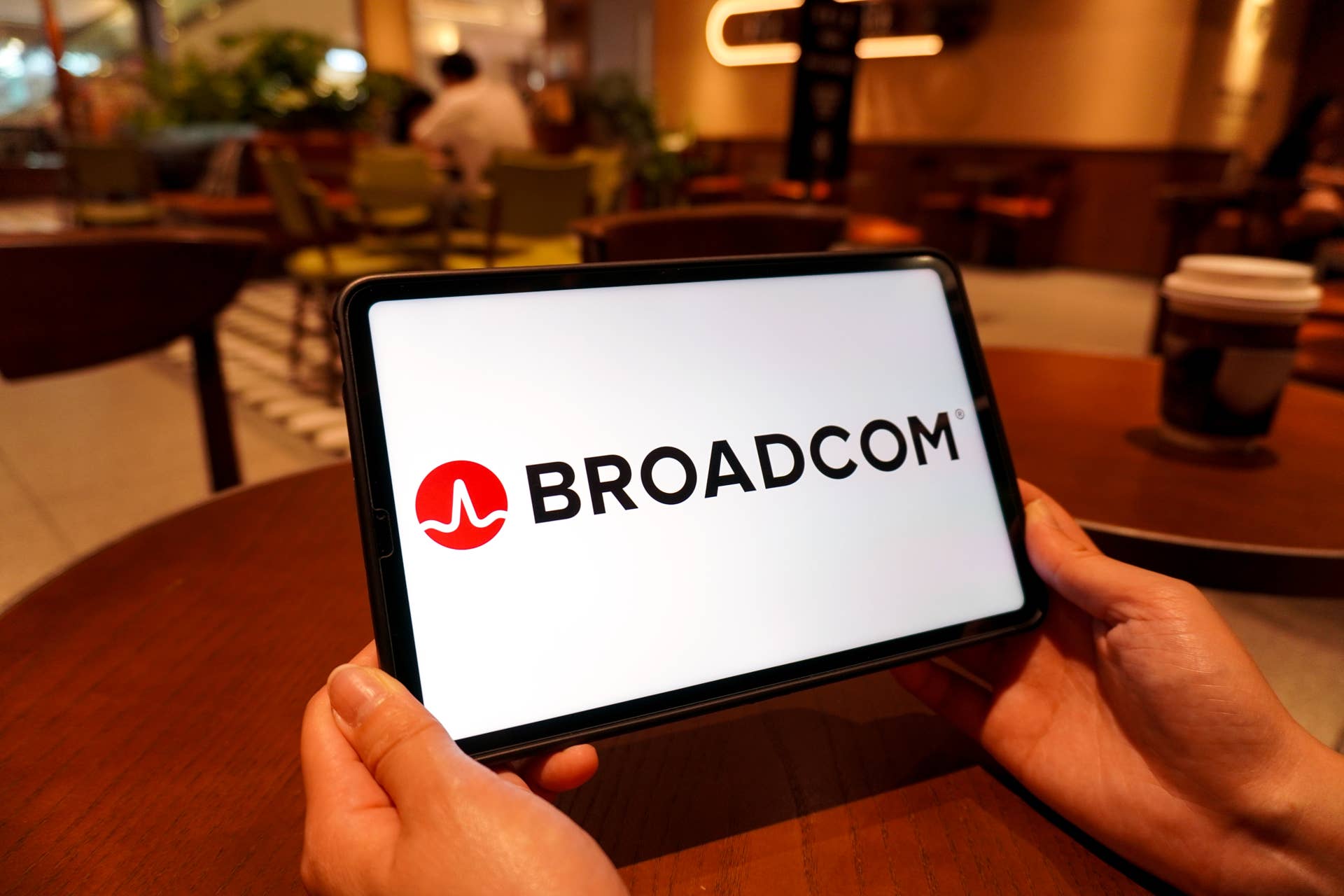 Broadcom logo appears on an iPad.