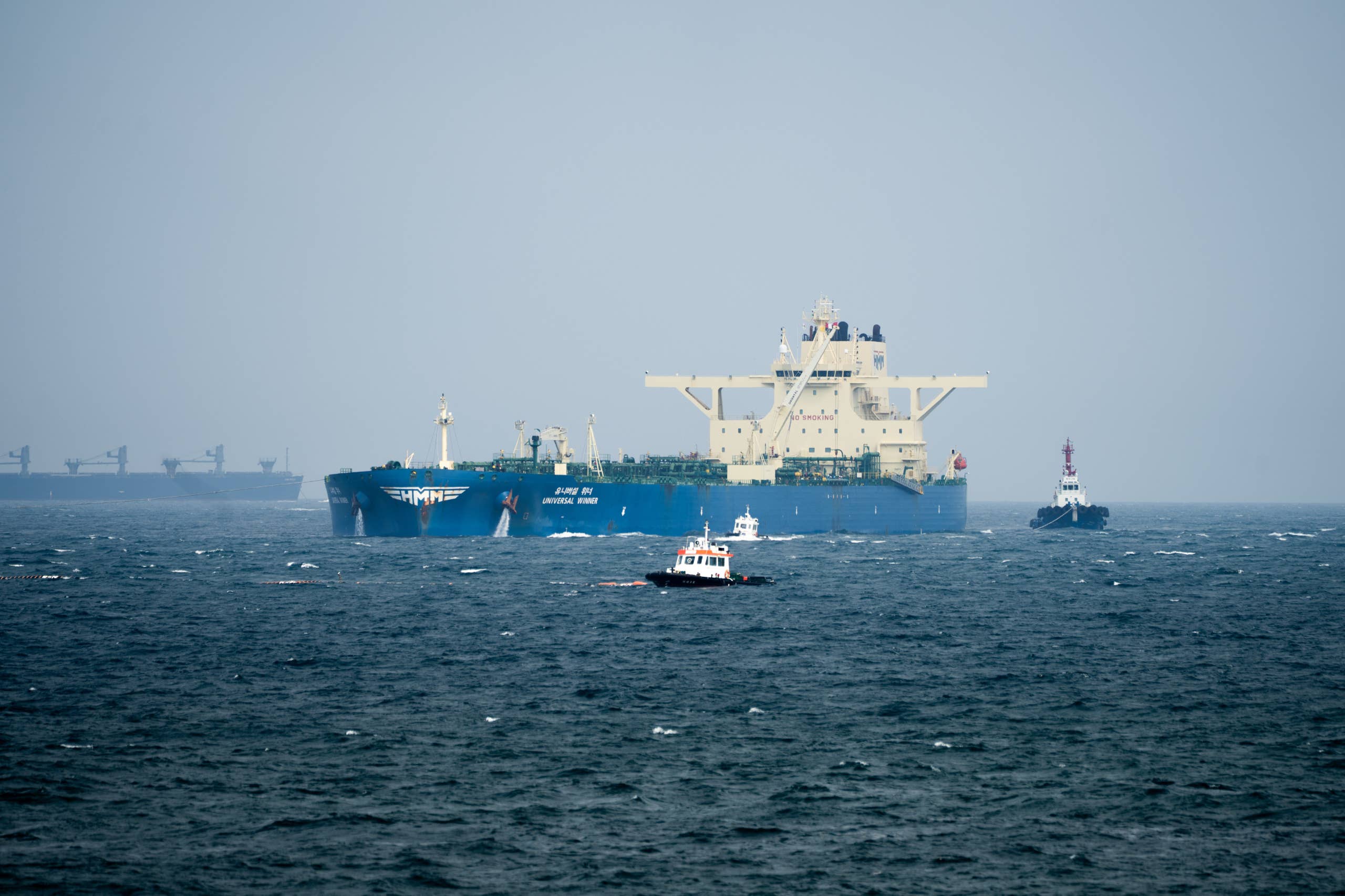 The oil tanker Universal Winner, described as the first South Korean vessel to exit the Strait of Hormuz after being stranded there since the outbreak of conflict in the Middle East, arrives at the port of Ulsan, South Korea