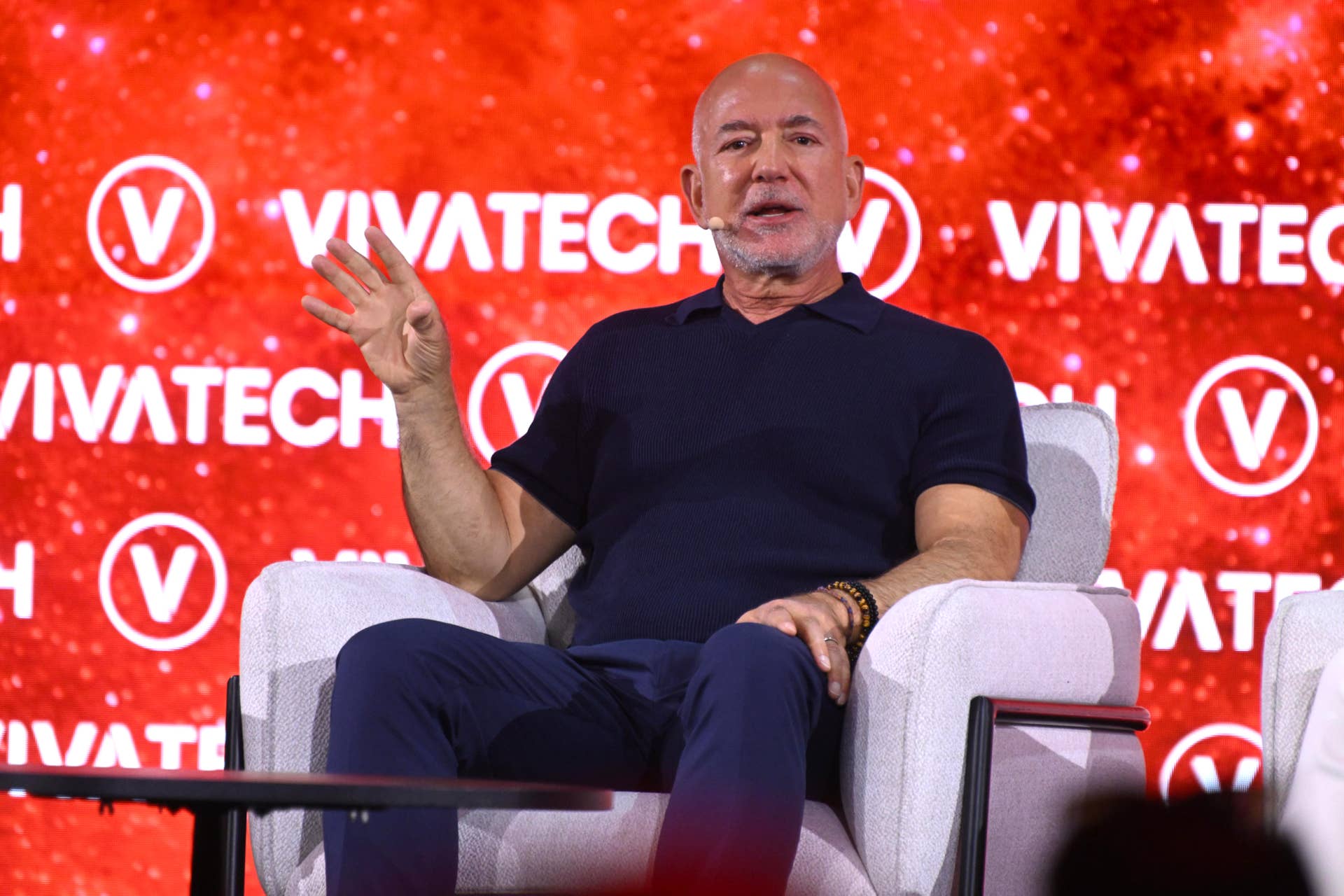 Jeff Bezos Using Computer Jeff Bezos breaks ranks on what AI will do to your job - TheStreet