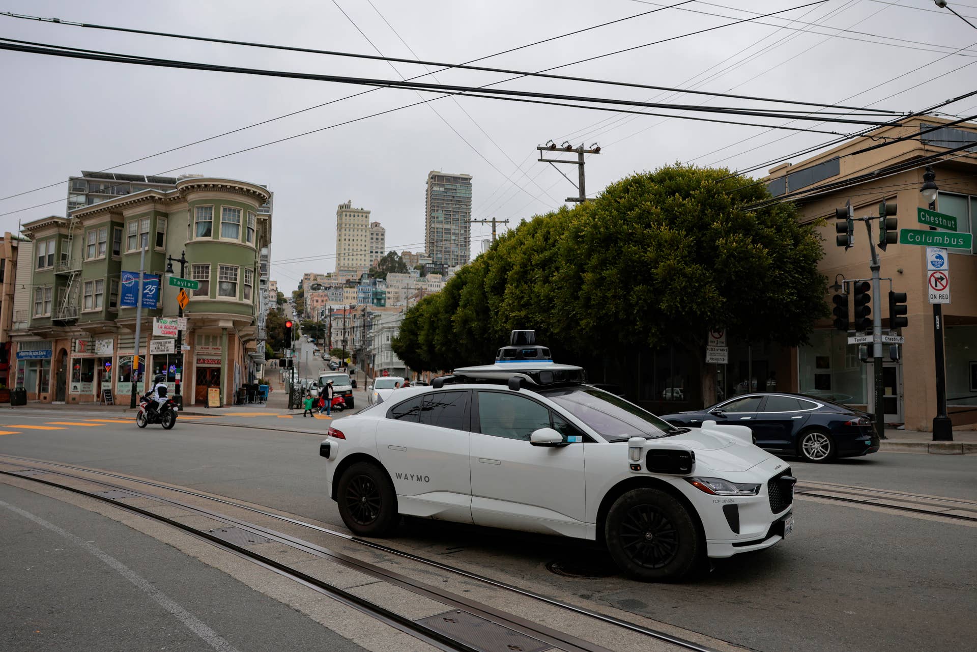 A Waymo robotaxi drives in San Francisco, California.