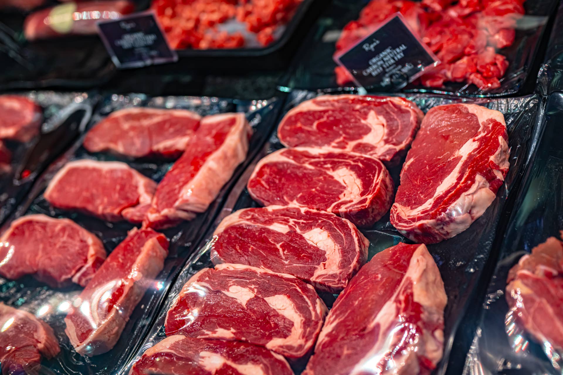 Packaged beef in grocery store meat department.