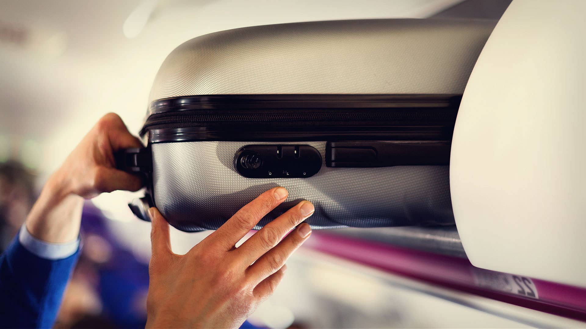 Passenger with carry-on luggage