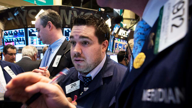 Dow Jumps Nearly 100 Points as Nasdaq, S&P 500 Slide