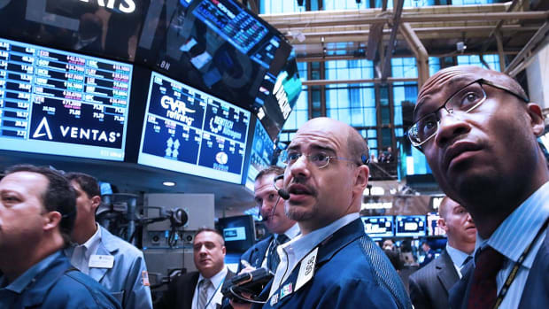 Dow Ends up More Than 200 Points as Rate-Cut Hopes Spur Stocks