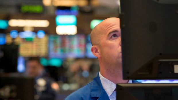 Dow Ends Lower as Stocks Slide on Slowing Growth
