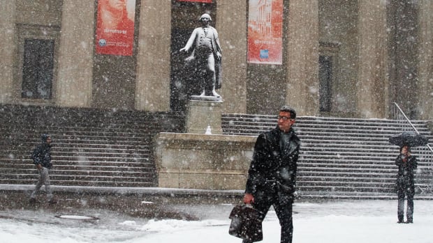 Dow Comes Off Session Lows, Finishes Day Down More Than 400 Points