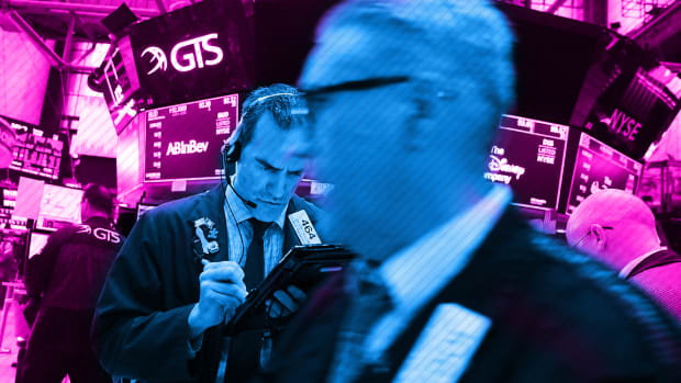 Dow Finishes Slightly Lower as Nasdaq Jumps to Another Record Close