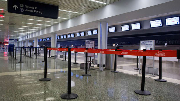 Wall St Ends Higher, AA Grounded