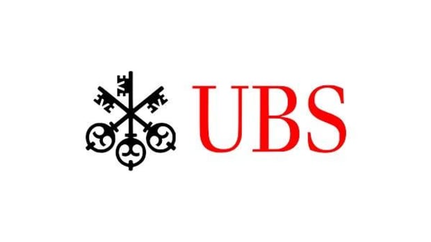 UBS Warns on Outlook as Net Falls After Charges