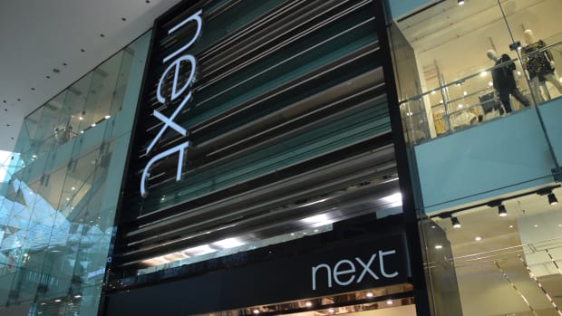 Next Stock Plummets on Profit Warning as British Retailers Struggle
