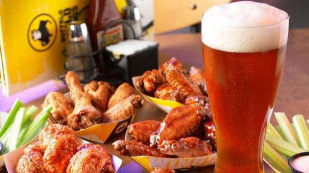 Midday Report: Marcato Calls for Buffalo Wild Wings Shakeup; Amex Drives Dow Gains