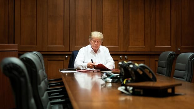 US President Donald Trump works in a conference room while receiving treatment for Covid-19 at Walter Reed National Military Medical Center in Bethesda, Maryland, on Saturday. Photo: Reuters