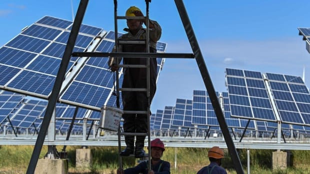 Annual renewable energy investments need to nearly triple to reach international climate goals, according to the Climate Policy Initiative and the International Renewable Energy Agency. Photo: AFP