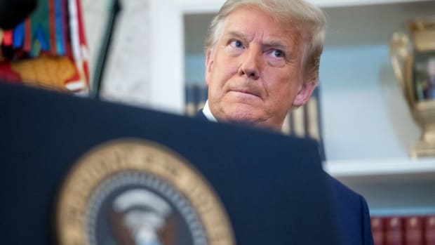 President Donald Trump has used an executive order to bar Americans from investing in 35 Chinese companies deemed to have military ties. Photo: AFP via Getty Images/TNS