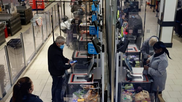 Grocery stores and supermarkets are adopting contactless payment technology to help maintain social distancing. Photo: AFP