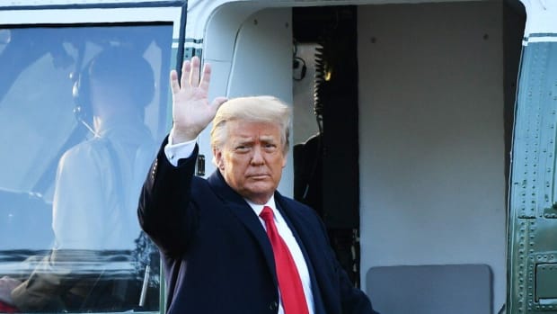 Former US President Donald Trump signed an executive order in November that bars American investors from owning the stocks of 35 companies with purported ties to the Chinese military. Photo: AFP