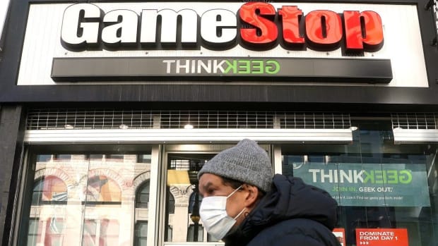 A person walks past a GameStop in the Manhattan borough of New York City, New York, on January 29, 2021. Photo: Reuters