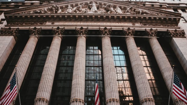 Facade of New York Stock Exchange building on Wall Street.