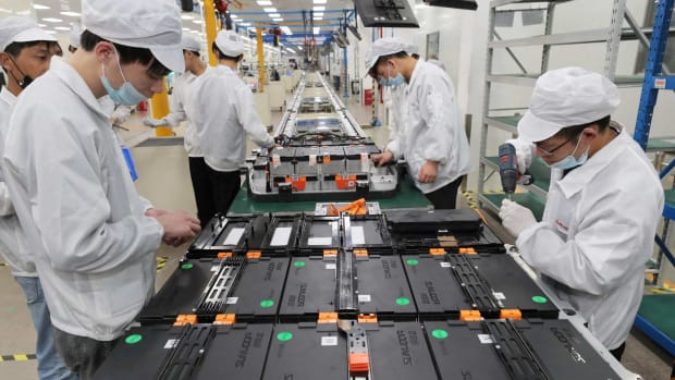 Workers at a factory for Xinwangda Electric Vehicle Battery seen making lithium battery packs for electric cars and other uses, in Nanjing, in China's eastern Jiangsu province. Photo: AFP