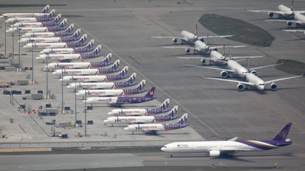 Grounded planes at Hong Kong International Airport earlier this month. One analyst said it was likely 53 per cent of the world's commercial jet fleet would be idle. Photo: Robert Ng
