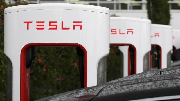 Tesla charging stations are shown outside of the Tesla factory in Fremont, Calif. Photo: AP