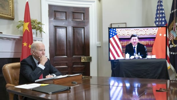 US President Joe Biden listens while meeting virtually with Xi Jinping, China's president, in the Roosevelt Room of the White House in Washington, D.C. on Monday, Nov. 15, 2021. Photo: Bloomberg