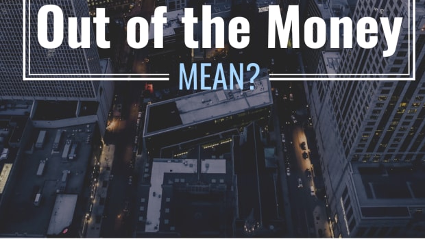Darkened, bird's eye photo of a city with text overlay that reads "What Does Out of the Money Mean?"