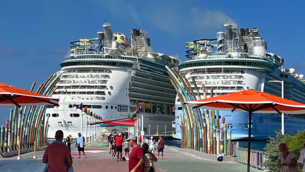The Freedom and Mariner of the Seas docked at Coco Cay.