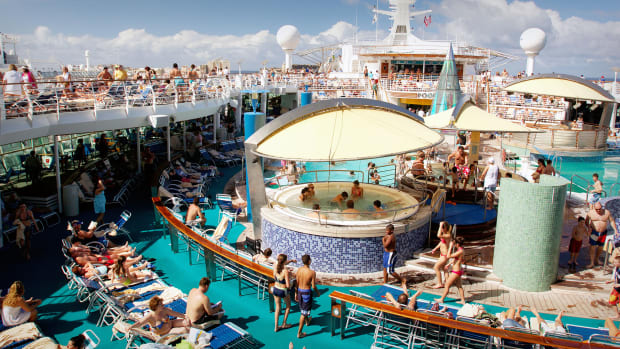 A crowded Royal Caribbean pool deck. Royal Caribbean Lead JS