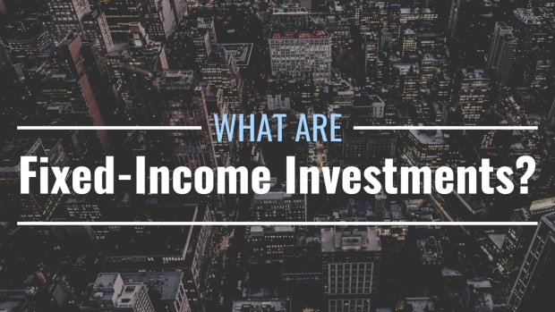 Darkened photo of New York City from above with text overlay that reads "What Are Fixed-Income Investments?"