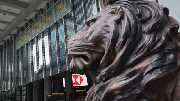 Stitt, one of HSBC's iconic lion sculptures, stands guard outside the bank's main building in Hong Kong. Photo: Sam Tsang