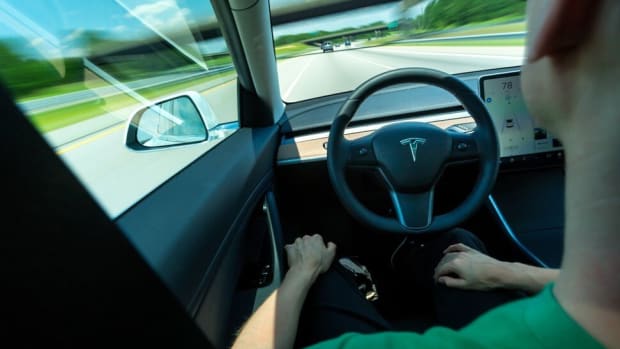 Tesla instructs drivers to keep their hands on the wheel when its Autopilot feature is engaged. The feature has been implicated in multiple accidents, drawing scrutiny in Washington. (Dreamstime/TNS)