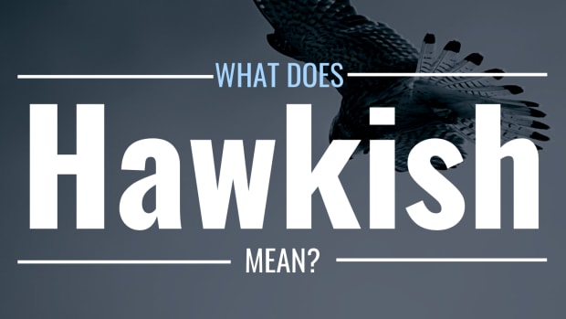 Image of a hawk flying with text overlay: "What Does Hawkish Mean?"