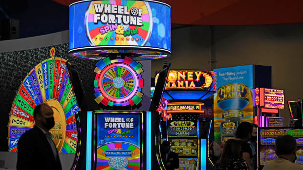A bank of Wheel of Fortune slot machines. Lead JS