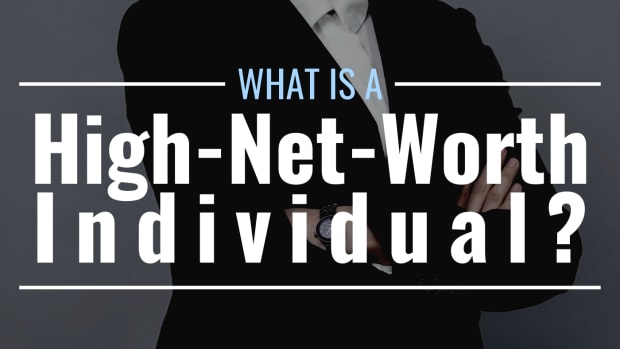 Darkened photo of a person's torso in a fancy suit against a plain background with text overlay that reads "What Is a High-Net-Worth Individual?"