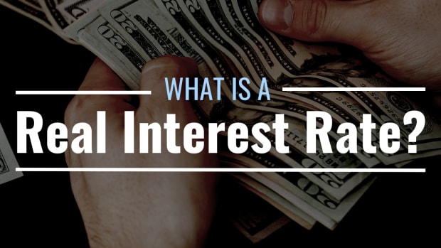 Photo of a cash being counted with text overlay that reads "What Is a Real Interest Rate?"