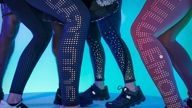 The legs of a group of women wearing Lululemon. Lead.