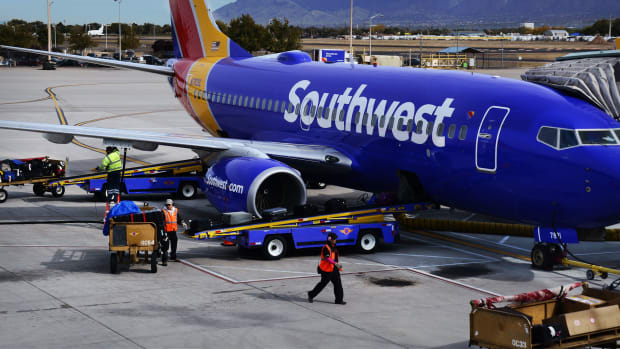 A Southwest Airlines plane sits on the Tarmac. Lead JS 102122