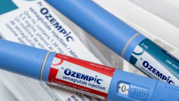 An Ozempic semaglutide injection pens and box are seen. -lead