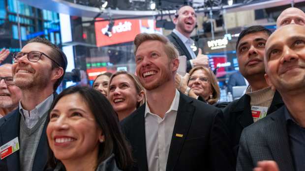 NEW YORK, NEW YORK - MARCH 21: Reddit CEO Steve Huffman stands on the floor of the New York Stock Exchange with employees (NYSE) as it prepares for Reddit's initial public offering (IPO) on March 21, 2024 in New York City. The social media platform Reddit priced its IPO in the range of $31 to $34 per share on Wednesday. Reddit has raised  $748 million and its IPO share price will be determined later in the trading day.  (Photo by Spencer Platt/Getty Images)
