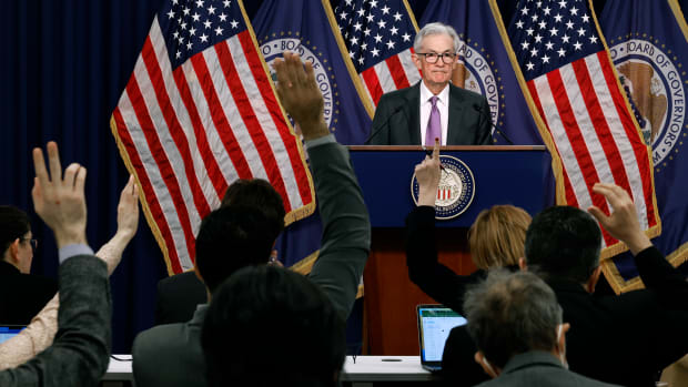 WASHINGTON, DC - MARCH 20: Reporters raise their hands to ask questions of Federal Reserve Bank Chair Jerome Powell during a news conference at the bank's William McChesney Martin building on March 20, 2024 in Washington, DC. Following a meeting of the Federal Open Markets Committee, Powell announced that the Fed left interest rates unchanged at about 5.3 percent, but suggested it may cut rates three times later this year as inflation eases. (Photo by Chip Somodevilla/Getty Images)