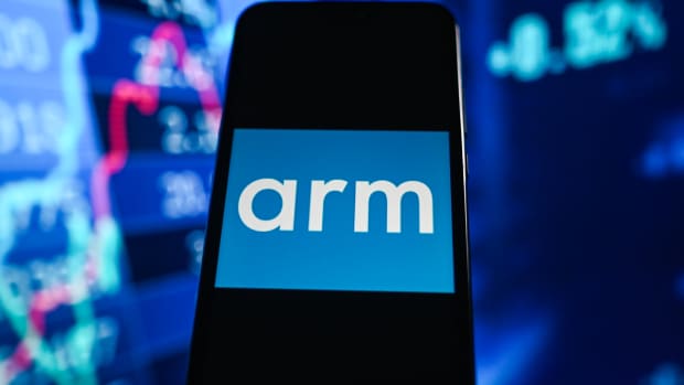 POLAND - 2023/09/19: In this photo illustration, the Arm Holdings logo seen displayed on a smartphone with stock market percentages in the background. (Photo Illustration by Omar Marques/SOPA Images/LightRocket via Getty Images)