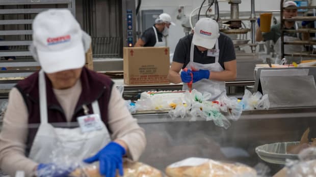 Employees work in the bakery department of a Costco Wholesale Corp. store in San Francisco, California, U.S., on Wednesday, Dec. 5, 2018. Costco Wholesale Corp. is scheduled to release earnings figures on December 13. Photographer: David Paul Morris/Bloomberg via Getty Images
